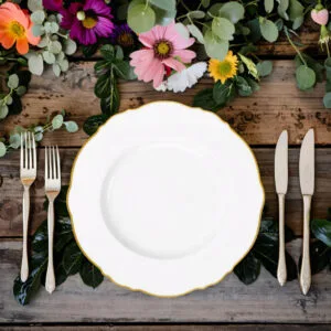 white bone china dinner plate with gilded wavy edge