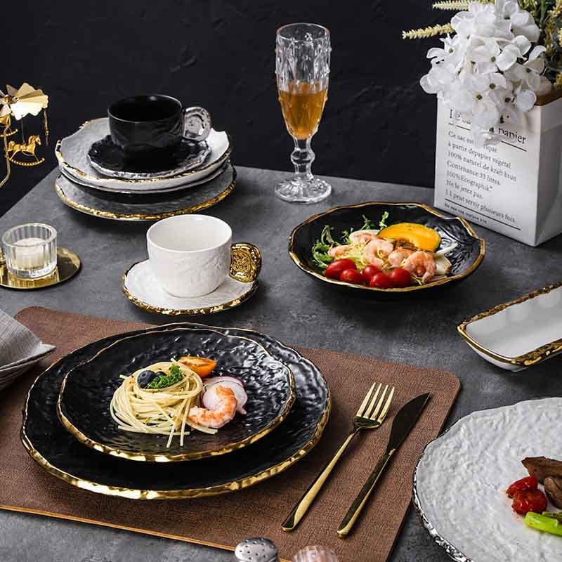 Luxury gold rimmed black irregular ceramic plate set
