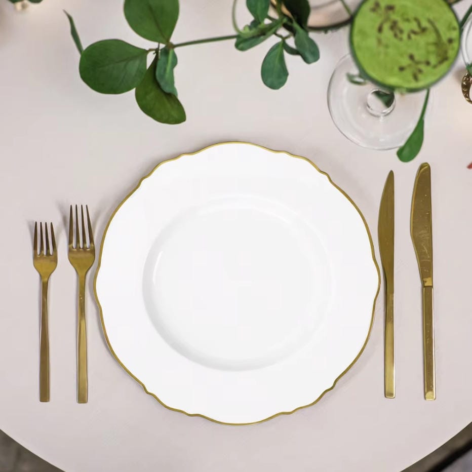 white bone china dinner plate with gilded wavy edge