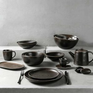 Product Description This tableware set centers on dark brown kiln-change glaze + vintage spiral pattern design, crafted from ceramic. The glaze presents a rich dark brown kiln-change finish paired with understated spiral textures, fitting the dining scenarios of dark-style Western restaurants, Japanese izakayas, and industrial-style home tables, infusing a calm and high-end atmosphere into meals. It blends aesthetics with functionality: The dark brown kiln-change glaze features a vintage matte texture, combining uniqueness and quality; the spiral pattern details enhance visual layers and suit serving diverse dishes like grilled meat, sushi, and thick soups; the multi-vessel combination (plates, bowls, teapots, cups) covers scenarios like formal meals and tea service. Matching with same-color cutlery creates a unified style. Whether for distinctive serving in restaurants or quality family gatherings, this tableware set becomes a textured highlight on the dining table with its calm vintage style.