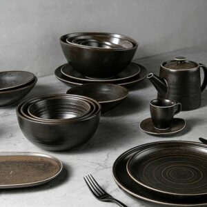 Product Description This tableware set centers on dark brown kiln-change glaze + vintage spiral pattern design, crafted from ceramic. The glaze presents a rich dark brown kiln-change finish paired with understated spiral textures, fitting the dining scenarios of dark-style Western restaurants, Japanese izakayas, and industrial-style home tables, infusing a calm and high-end atmosphere into meals. It blends aesthetics with functionality: The dark brown kiln-change glaze features a vintage matte texture, combining uniqueness and quality; the spiral pattern details enhance visual layers and suit serving diverse dishes like grilled meat, sushi, and thick soups; the multi-vessel combination (plates, bowls, teapots, cups) covers scenarios like formal meals and tea service. Matching with same-color cutlery creates a unified style. Whether for distinctive serving in restaurants or quality family gatherings, this tableware set becomes a textured highlight on the dining table with its calm vintage style.