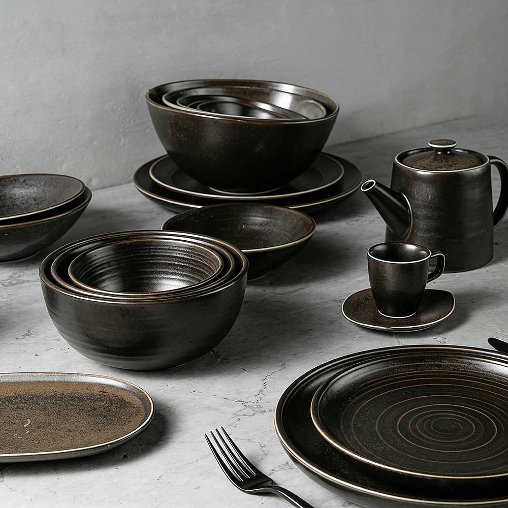 Product Description This tableware set centers on dark brown kiln-change glaze + vintage spiral pattern design, crafted from ceramic. The glaze presents a rich dark brown kiln-change finish paired with understated spiral textures, fitting the dining scenarios of dark-style Western restaurants, Japanese izakayas, and industrial-style home tables, infusing a calm and high-end atmosphere into meals. It blends aesthetics with functionality: The dark brown kiln-change glaze features a vintage matte texture, combining uniqueness and quality; the spiral pattern details enhance visual layers and suit serving diverse dishes like grilled meat, sushi, and thick soups; the multi-vessel combination (plates, bowls, teapots, cups) covers scenarios like formal meals and tea service. Matching with same-color cutlery creates a unified style. Whether for distinctive serving in restaurants or quality family gatherings, this tableware set becomes a textured highlight on the dining table with its calm vintage style.