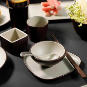 Product Features Minimalist Two-Tone Aesthetic Sophisticated dark brown and off-white contrast with crisp edge detailing, embodying modern minimalist and wabi-sabi style. Premium Food-Grade Melamine Lightweight, shatter-resistant, and durable, with the smooth texture of ceramic, ideal for daily use and commercial settings. Versatile Multi-Shape Set Includes round/square plates, bowls, divided dishes, and cups to cover all dining and serving needs. Safe & Easy-Care Non-toxic, odorless, and heat-resistant, with a smooth glaze that is dishwasher safe and easy to maintain. Multi-Scene Application & Gifting Perfect for home use, vacation rentals, and restaurants, also a thoughtful gift for housewarmings and business occasions.