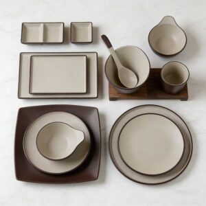 Product Features Minimalist Two-Tone Aesthetic Sophisticated dark brown and off-white contrast with crisp edge detailing, embodying modern minimalist and wabi-sabi style. Premium Food-Grade Melamine Lightweight, shatter-resistant, and durable, with the smooth texture of ceramic, ideal for daily use and commercial settings. Versatile Multi-Shape Set Includes round/square plates, bowls, divided dishes, and cups to cover all dining and serving needs. Safe & Easy-Care Non-toxic, odorless, and heat-resistant, with a smooth glaze that is dishwasher safe and easy to maintain. Multi-Scene Application & Gifting Perfect for home use, vacation rentals, and restaurants, also a thoughtful gift for housewarmings and business occasions.