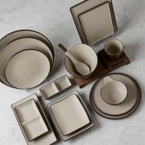 Product Features Minimalist Two-Tone Aesthetic Sophisticated dark brown and off-white contrast with crisp edge detailing, embodying modern minimalist and wabi-sabi style. Premium Food-Grade Melamine Lightweight, shatter-resistant, and durable, with the smooth texture of ceramic, ideal for daily use and commercial settings. Versatile Multi-Shape Set Includes round/square plates, bowls, divided dishes, and cups to cover all dining and serving needs. Safe & Easy-Care Non-toxic, odorless, and heat-resistant, with a smooth glaze that is dishwasher safe and easy to maintain. Multi-Scene Application & Gifting Perfect for home use, vacation rentals, and restaurants, also a thoughtful gift for housewarmings and business occasions.
