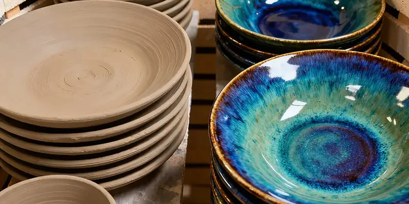 Why does glaze change color in the kiln